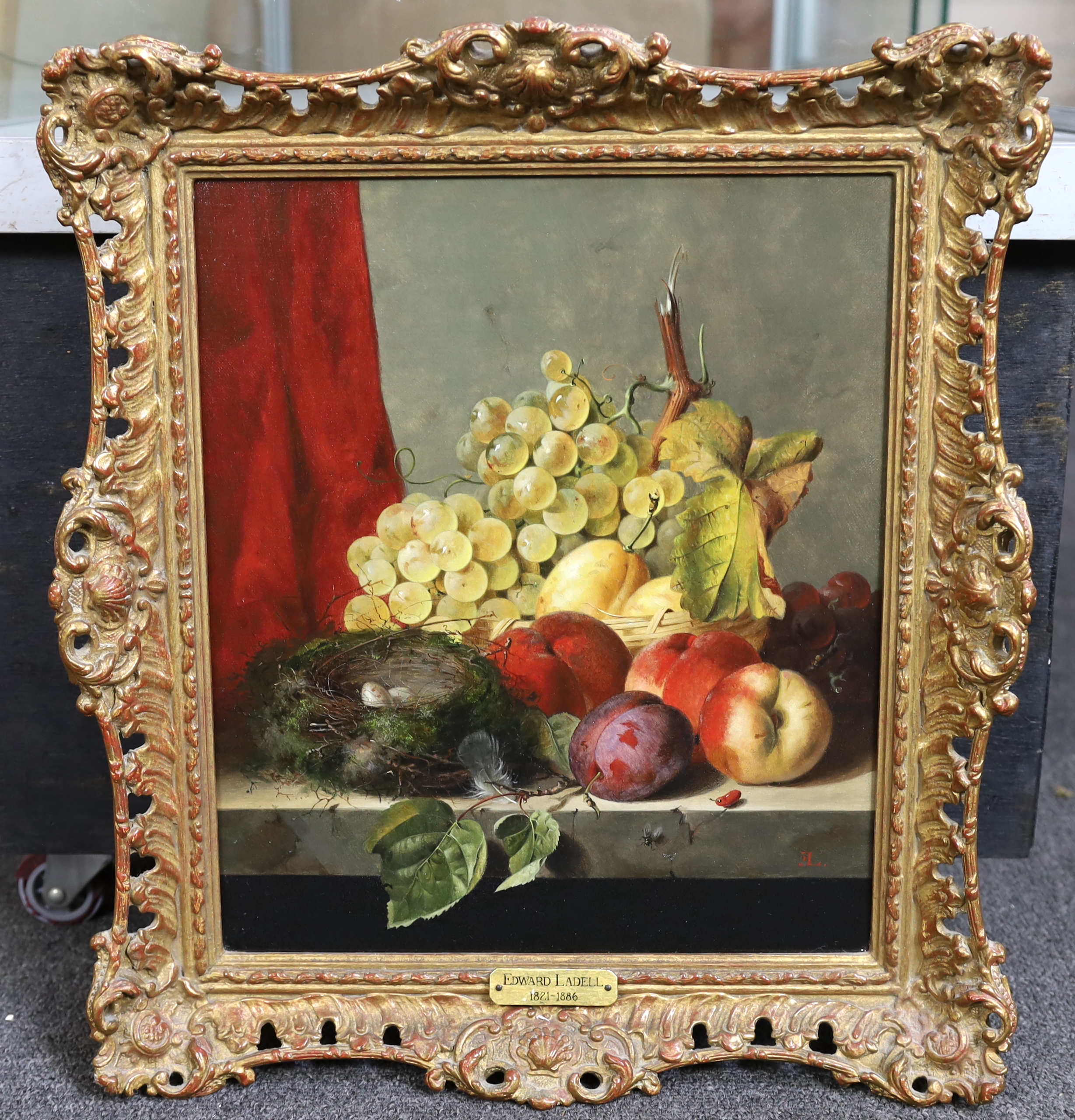 Edward Ladell (English, 1821-1886), Autumnal still life, with grapes, peaches and a birds nest, oil on canvas, 35 x 30cm, Please note this lot attracts an additional import tax of 5% on the hammer price